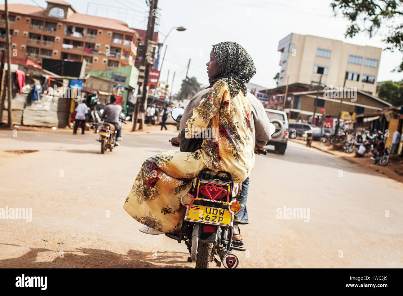 Boda-bodas, or motorcycle taxis, is one of the most regular transport forms in the most of Eastern Africa. A ride in central Kampala costs around 2000-4000 Uganda shillings, which is around $0.75-1.5. Stock Photo