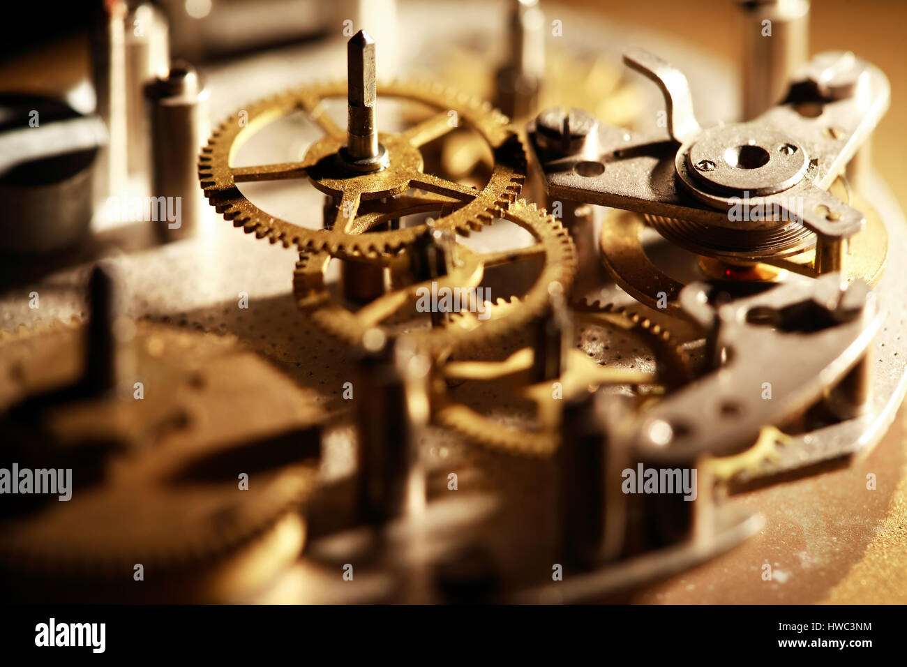 Machinery concept. Gears connection in old clock mechanism Stock Photo