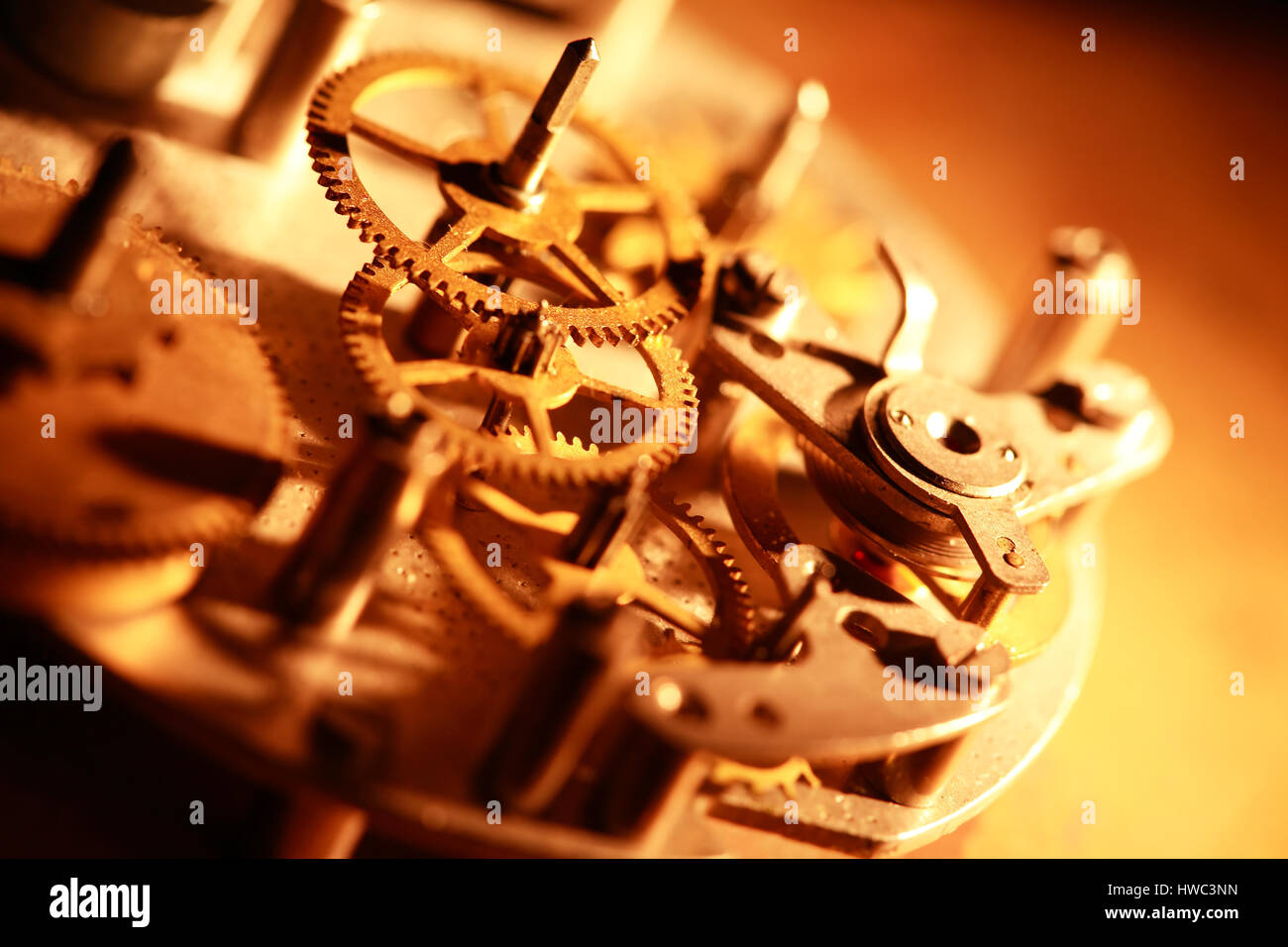 Machinery concept. Gears connection in old clock mechanism Stock Photo