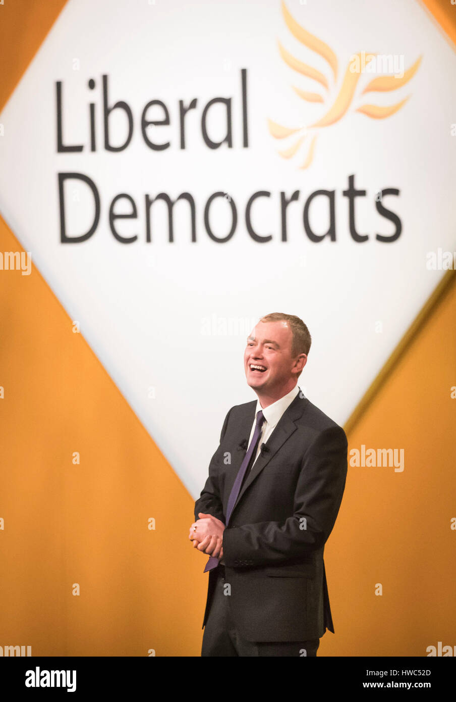 Leader of the Liberal Democrats Tim Farron during his keynote speech where he accused Theresa May of pursuing the same 'aggressive nationalistic' agenda as Donald Trump and Vladimir Putin, during the Liberal Democrat spring conference at the Barbican Centre in York. Stock Photo