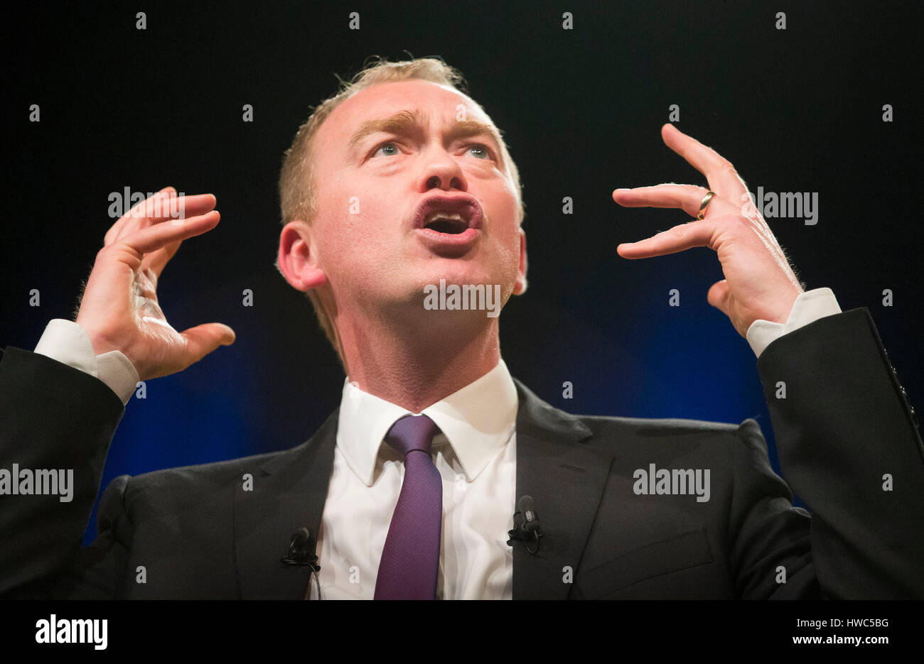 Leader of the Liberal Democrats Tim Farron during his keynote speech where he accused Theresa May of pursuing the same aggressive nationalistic agenda as Donald Trump and Vladimir Putin, during the Liberal Democrat spring conference at the Barbican Centre in York. Stock Photo