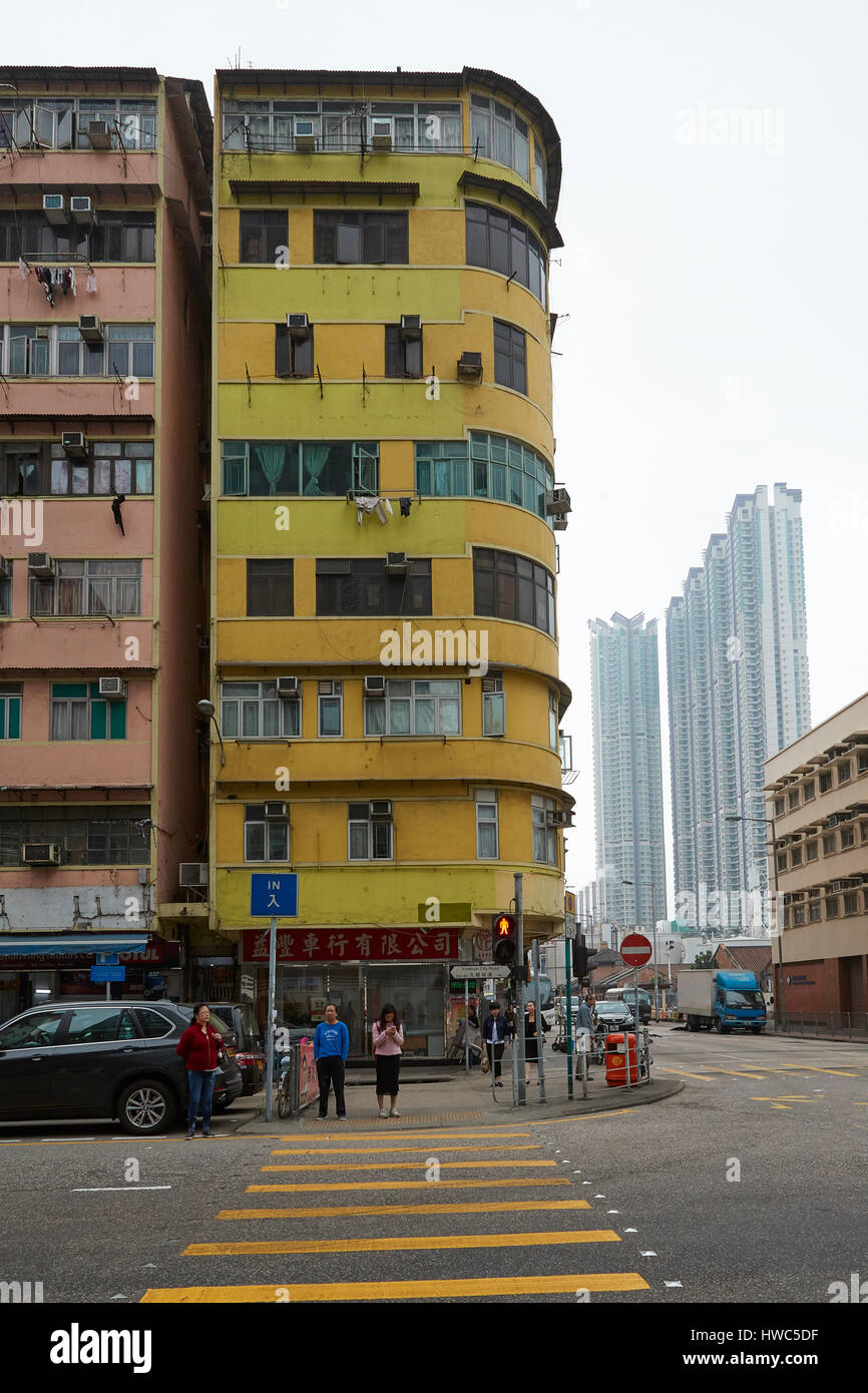 Contrasting Up Market And Low Rent Apartment Buildings In Kowloon City, Hong Kong. Stock Photo