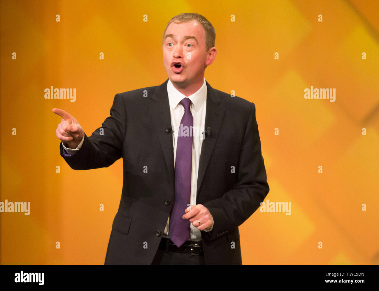 Leader of the Liberal Democrats Tim Farron during his keynote speech where he accused Theresa May of pursuing the same aggressive nationalistic agenda as Donald Trump and Vladimir Putin, during the Liberal Democrat spring conference at the Barbican Centre in York. Stock Photo