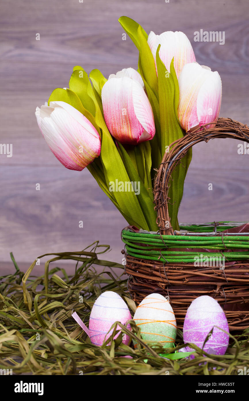 Easter decoration with eggs on a wooden background Stock Photo - Alamy