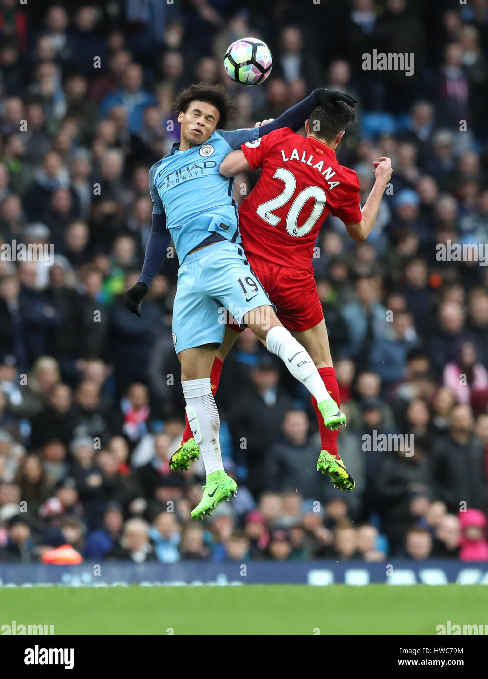 Manchester City's Leroy Sane (left) and Liverpool's Adam Lallana battle ...