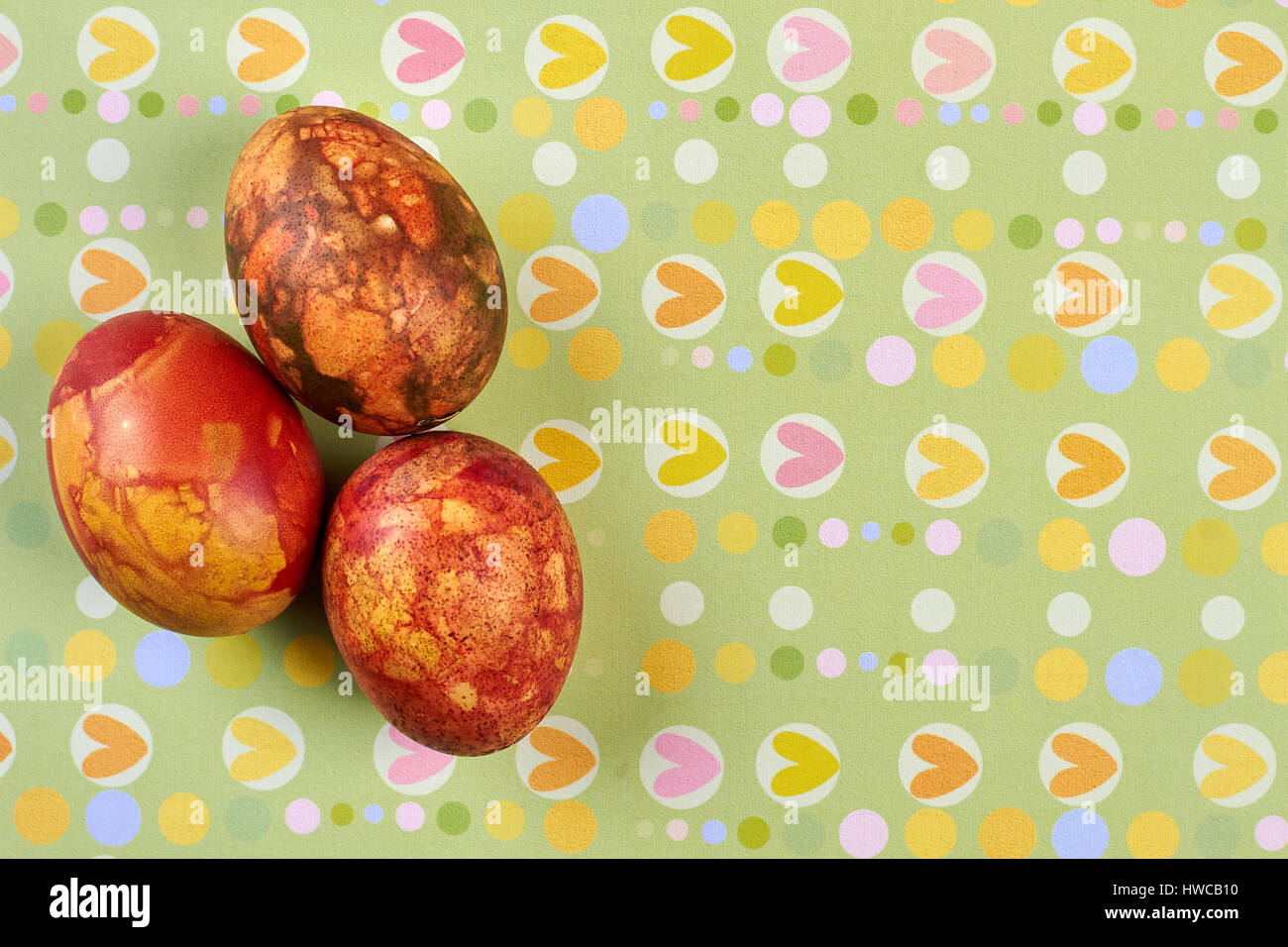 Eggs on heart pattern background Stock Photo - Alamy