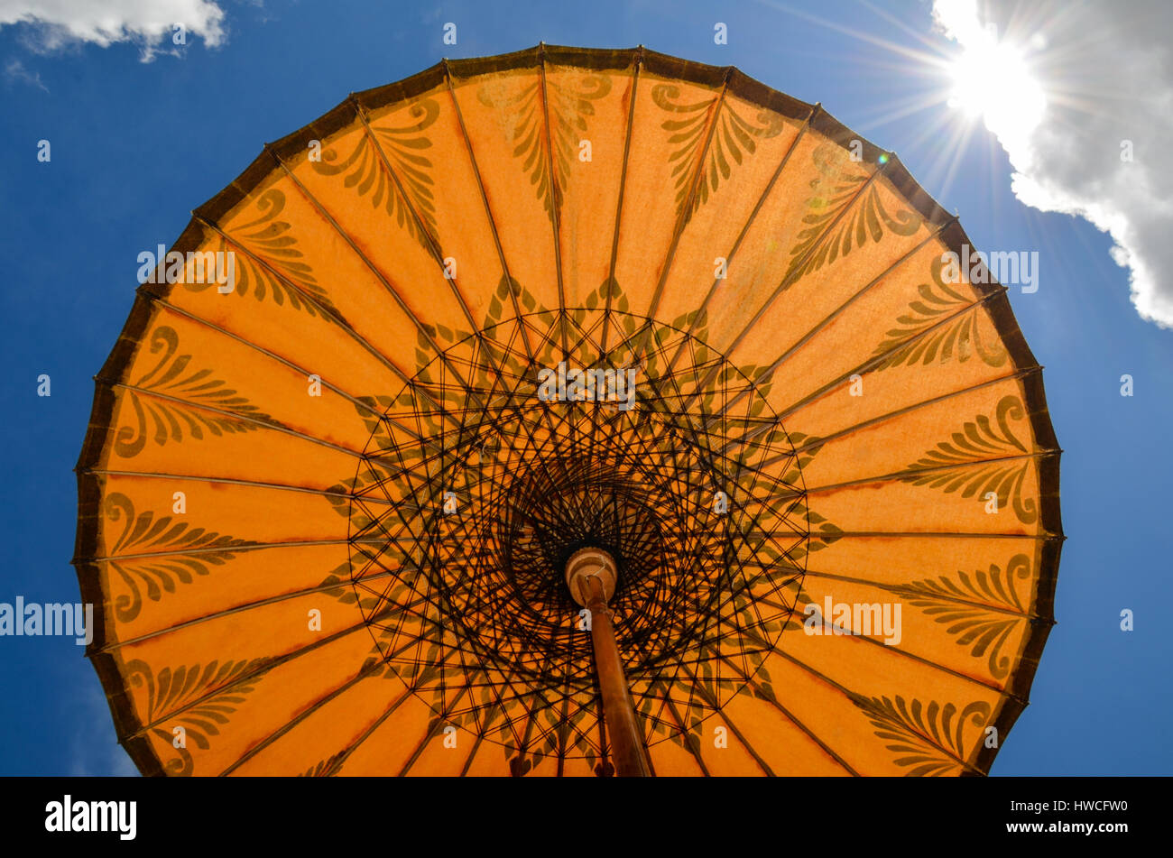 Colourful paper umbrellas for sale at a traditional paper making