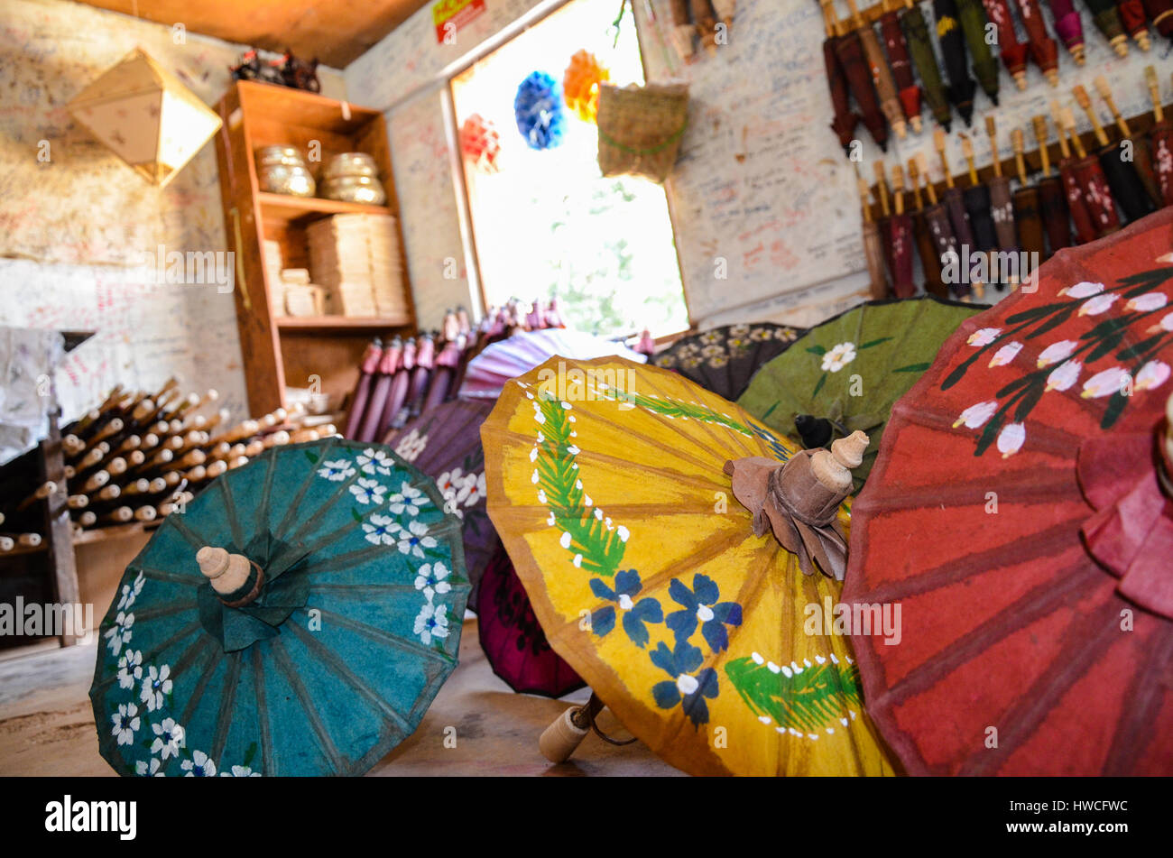 Colourful paper umbrellas for sale at a traditional paper making