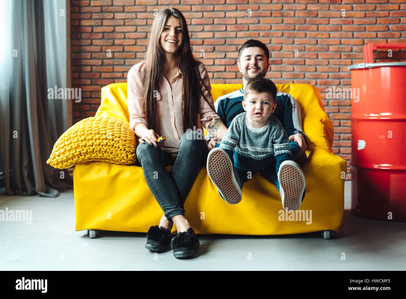 Young family having fun Stock Photo - Alamy