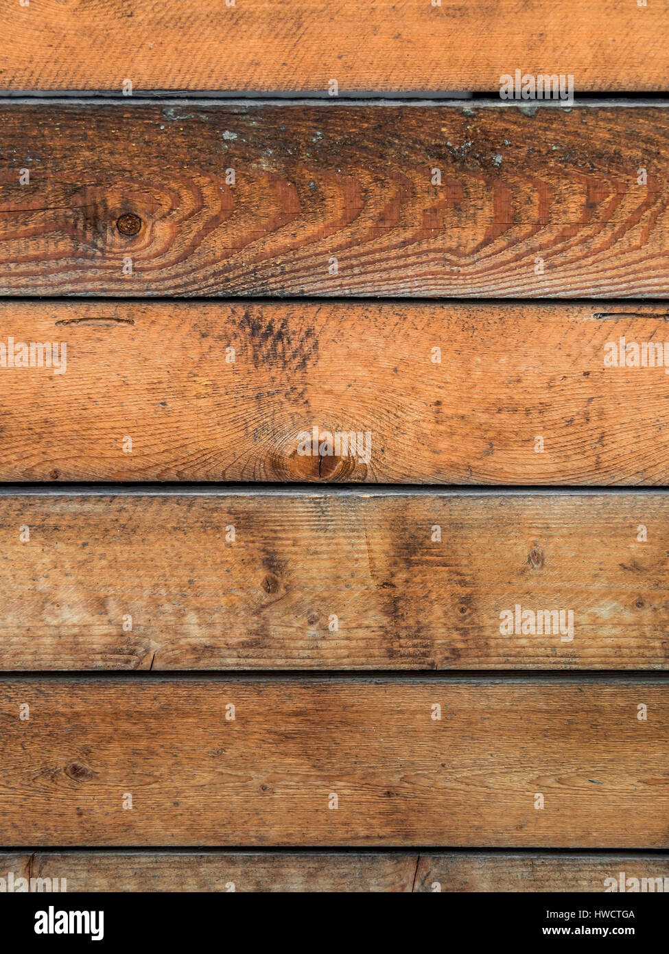 A wall from wooden slats with text clearance. Wooden wall as a Huintergrund for posters, Eine Wand aus Holzlatten mit Textfreiraum. Holzwand als Huint Stock Photo