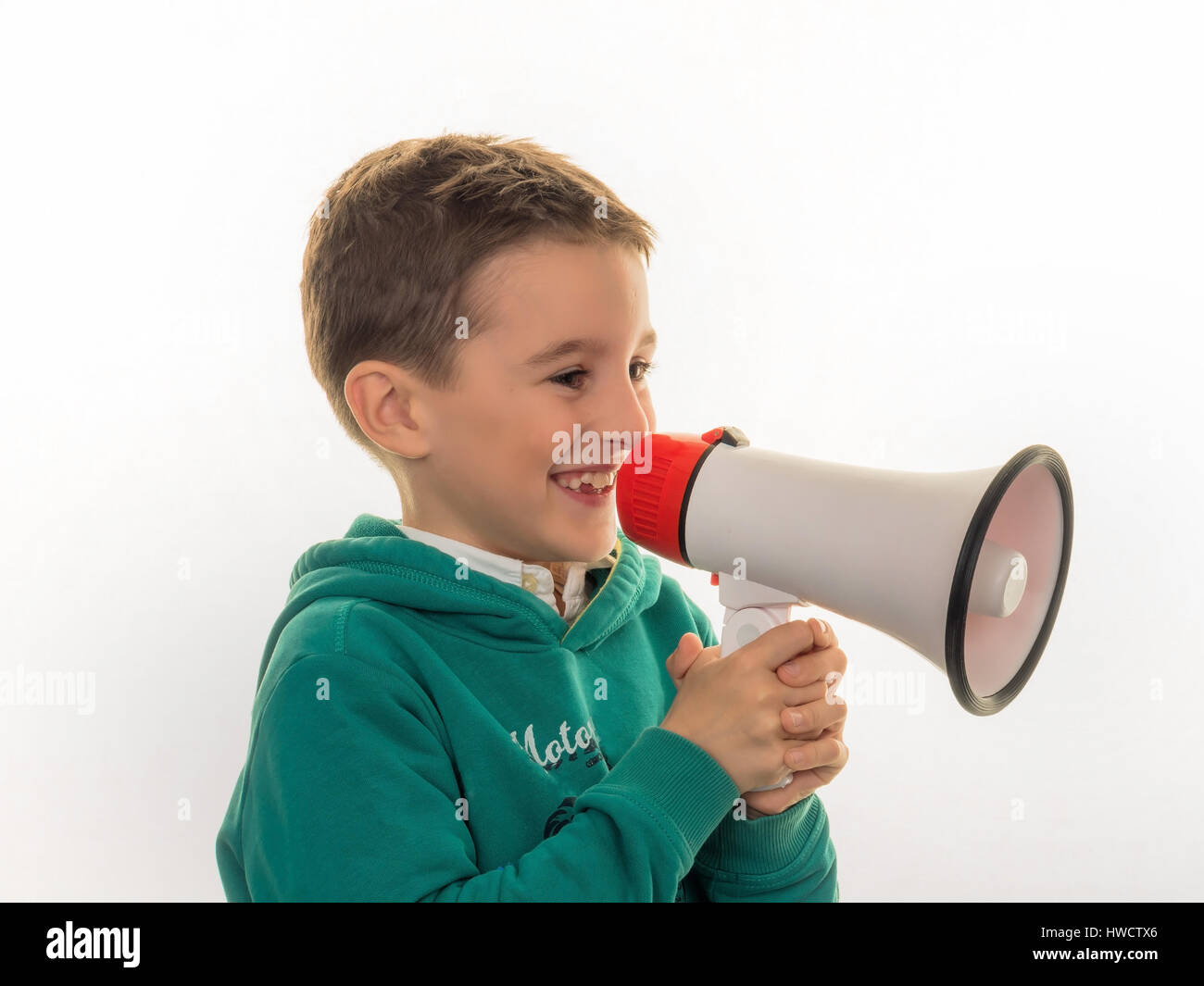 A child with a megaphone in the hand, Ein Kind mit einem Megaphon in der Hand Stock Photo