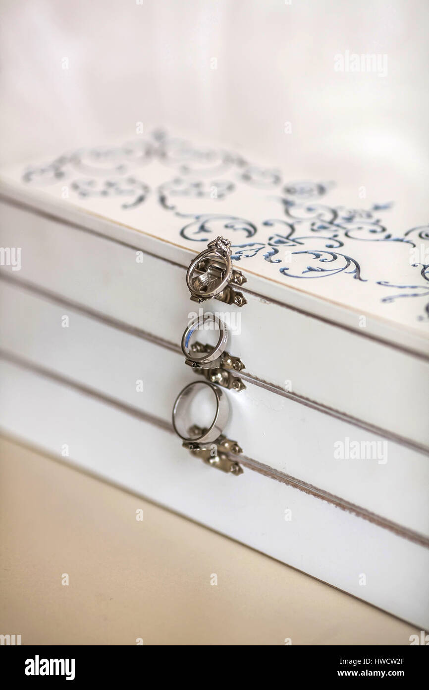 Wedding rings on a white vintage box Stock Photo