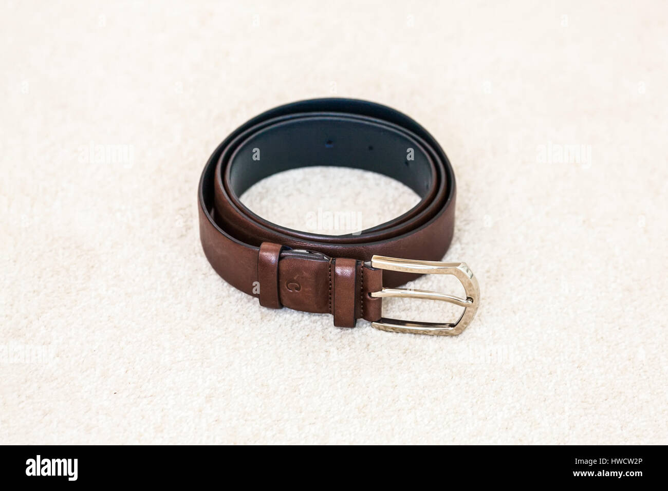 Brown wedding leather men's belt. Groom accessories Stock Photo - Alamy