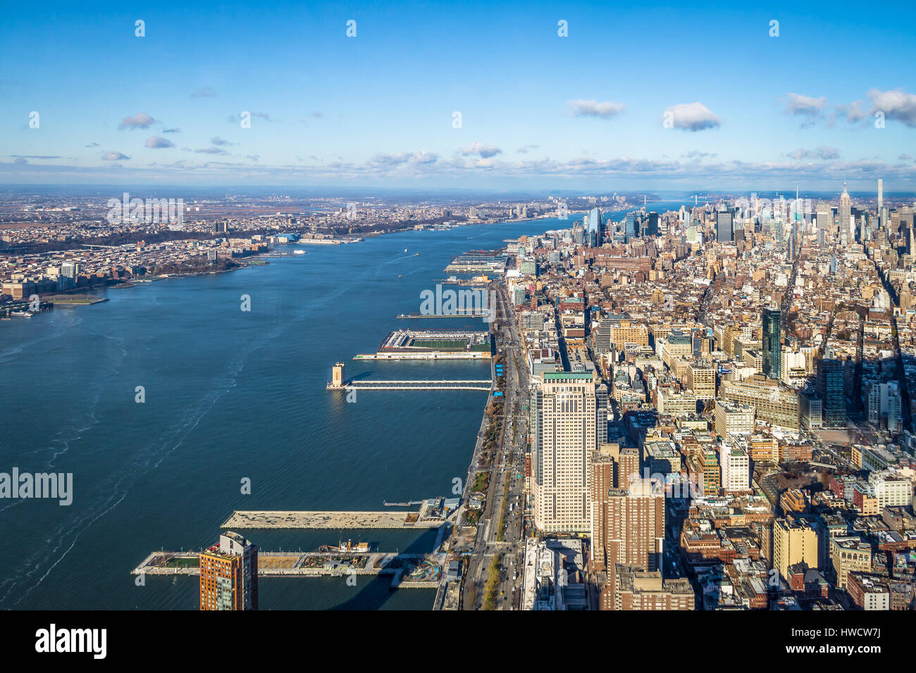Skyline aerial view of Manhattan with skyscrapers and Hudson River ...