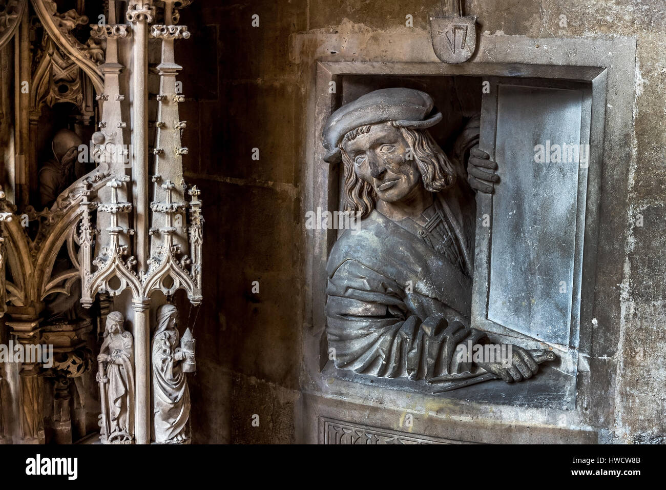 Austria, Vienna, Stephansdom. One of the landmarks of the town. Indoor photograph of the Fensterguckers in the pulpit., Österreich, Wien, Stephansdom. Stock Photo