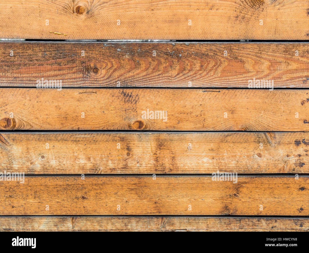 A wall from wooden slats with text clearance. Wooden wall as a Huintergrund for posters, Eine Wand aus Holzlatten mit Textfreiraum. Holzwand als Huint Stock Photo