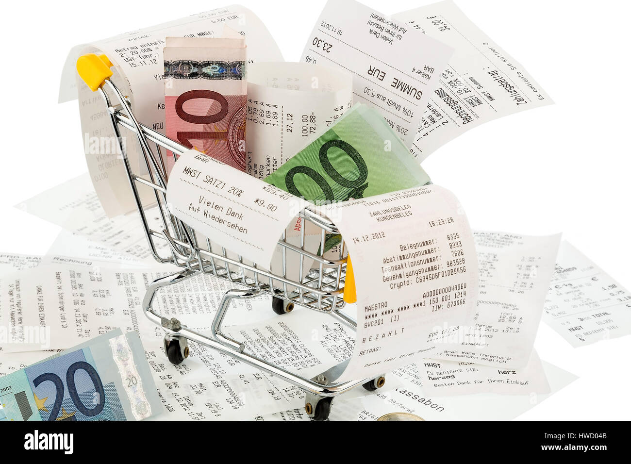Shopping carts, bank notes and receipts, symbolic photo for buying power, consumption and inflation, Einkaufswagen, Geldscheine und Kassenbons, Symbol Stock Photo