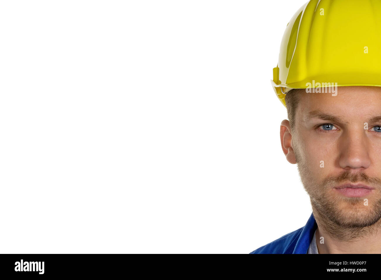 A worker in an industrial concern (craftsman) with helmet, Ein Arbeiter in einem Gewerbebetrieb ( Handwerker ) mit Helm Stock Photo