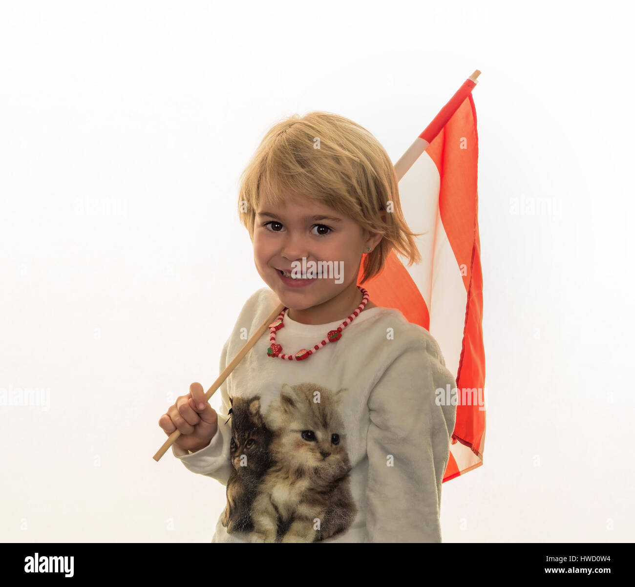 A child with flag of Austria in the hand, Ein Kind mit Flagge von Österreich in der Hand Stock Photo