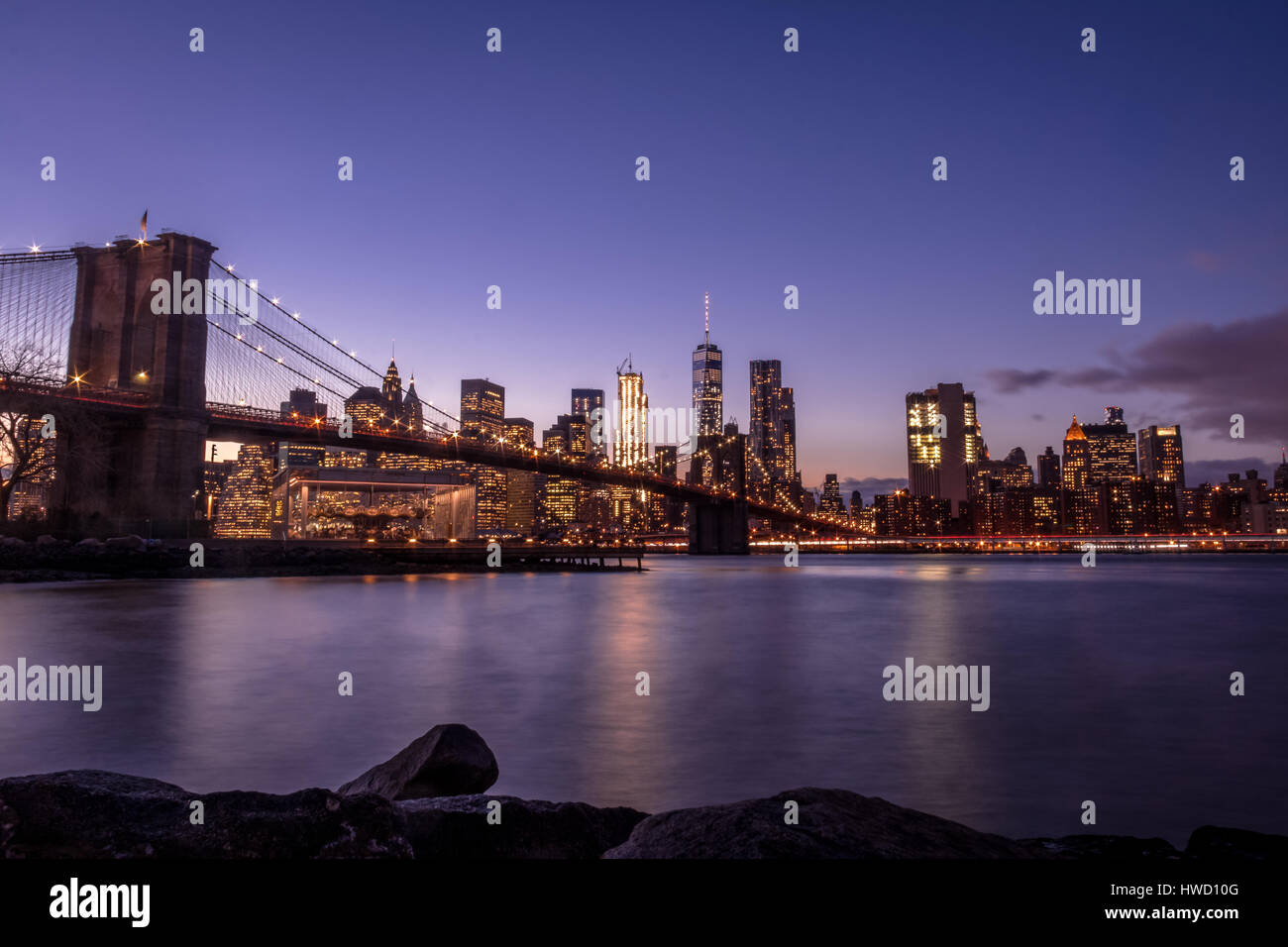 Brooklyn Bridge and Manhattan Skyline at sunset - New York, USA Stock ...