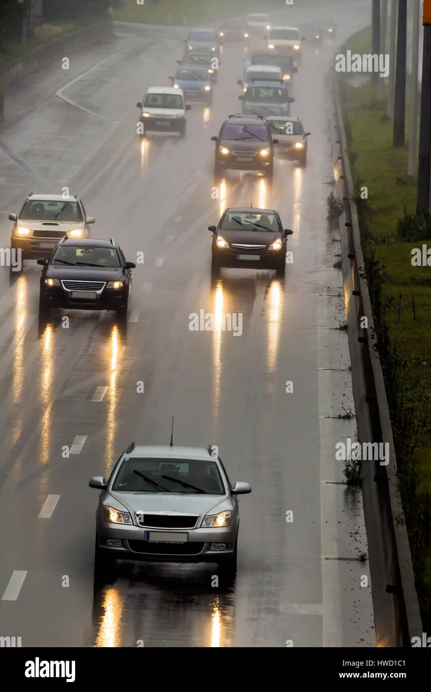 With rain on the highway, bad view, aquaplaning, accident danger, Bei Regen auf der Autobahn, schlechte Sicht, Aquaplaning, Unfallgefahr Stock Photo
