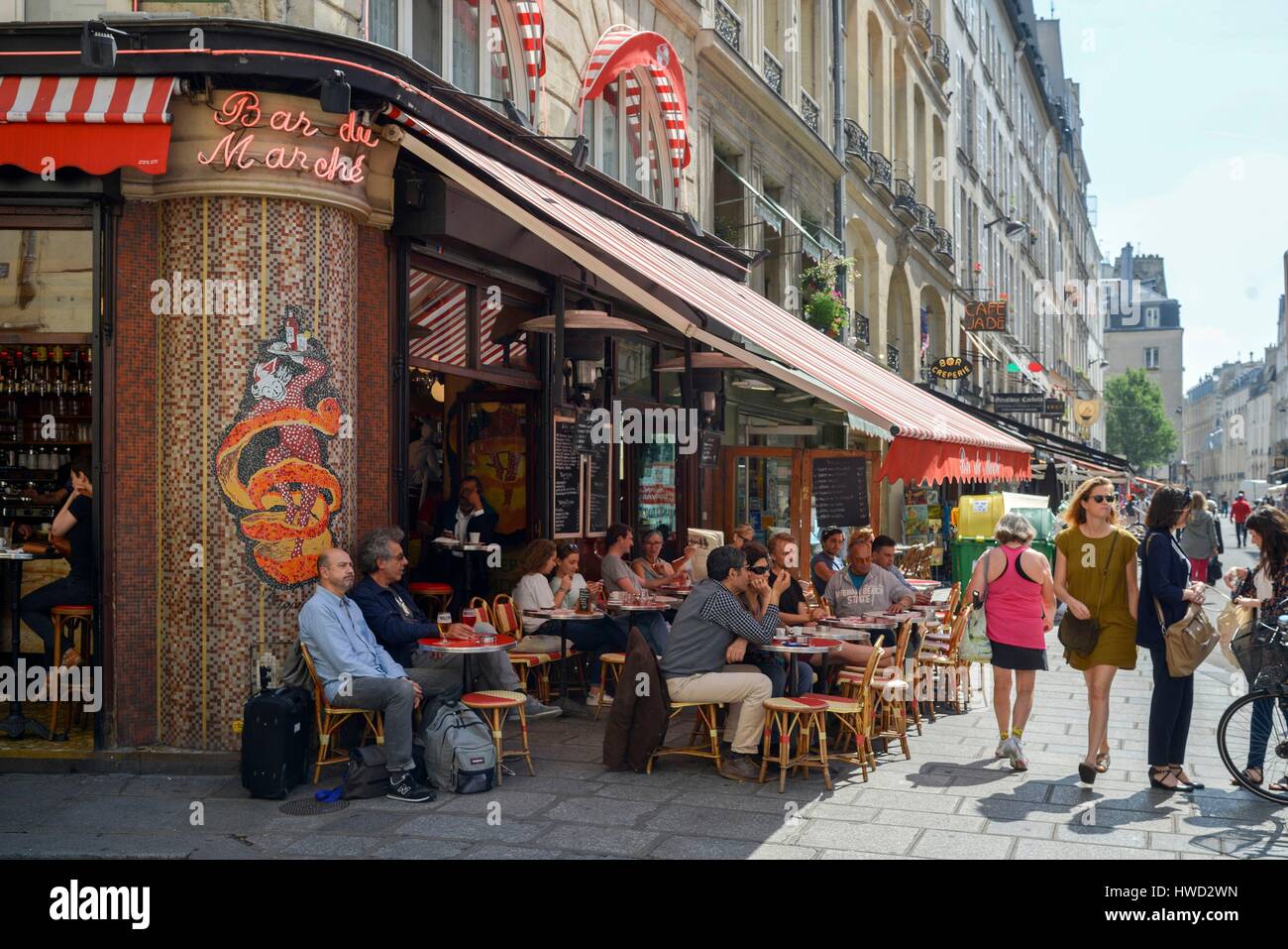 France, Paris, Rue de Buci, Bar Market, consumers sitting at a sidewalk ...