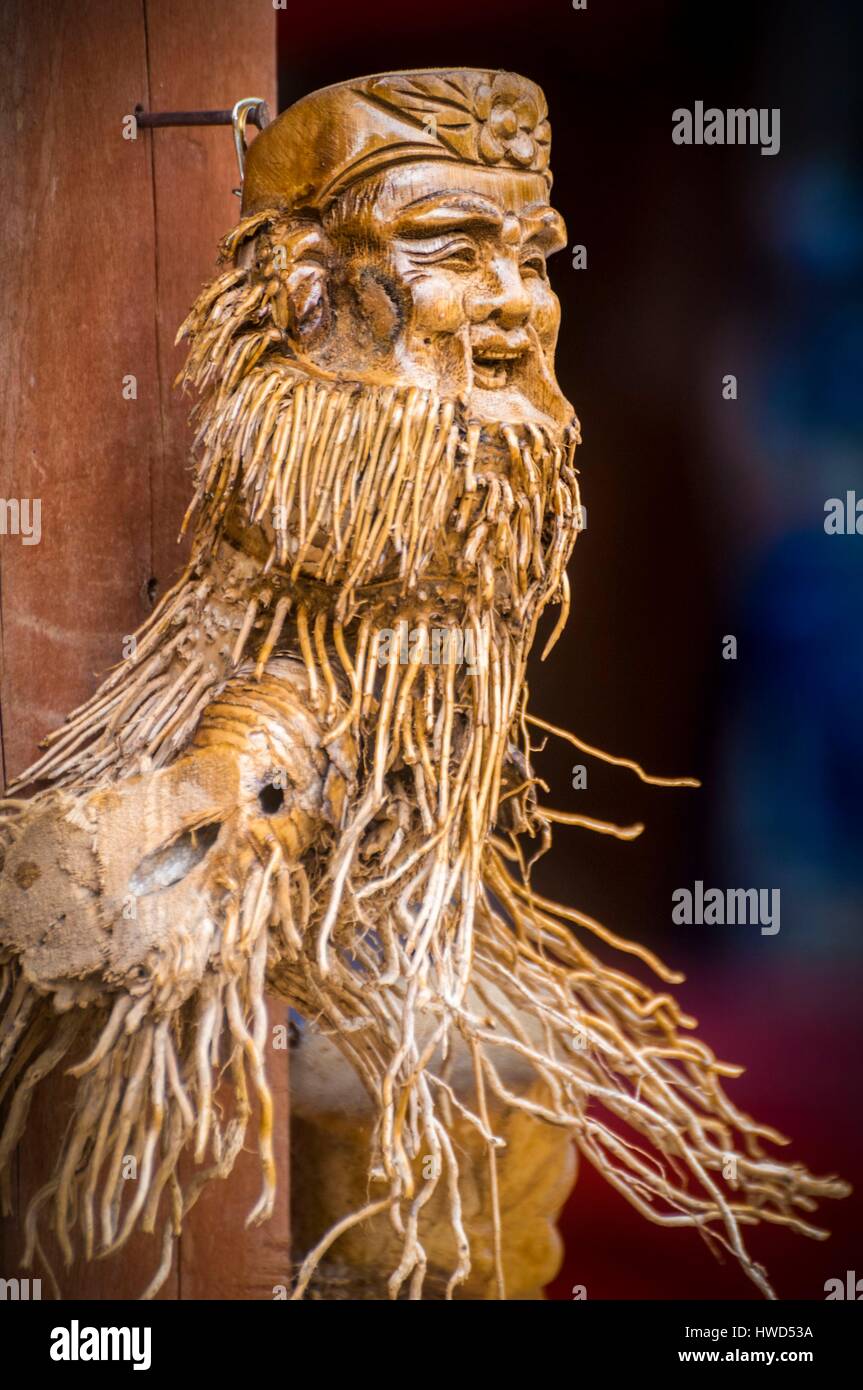 Vietnam, High Tonkin, province of Lao Cai, Sa Pa town, root carved bearded face Stock Photo