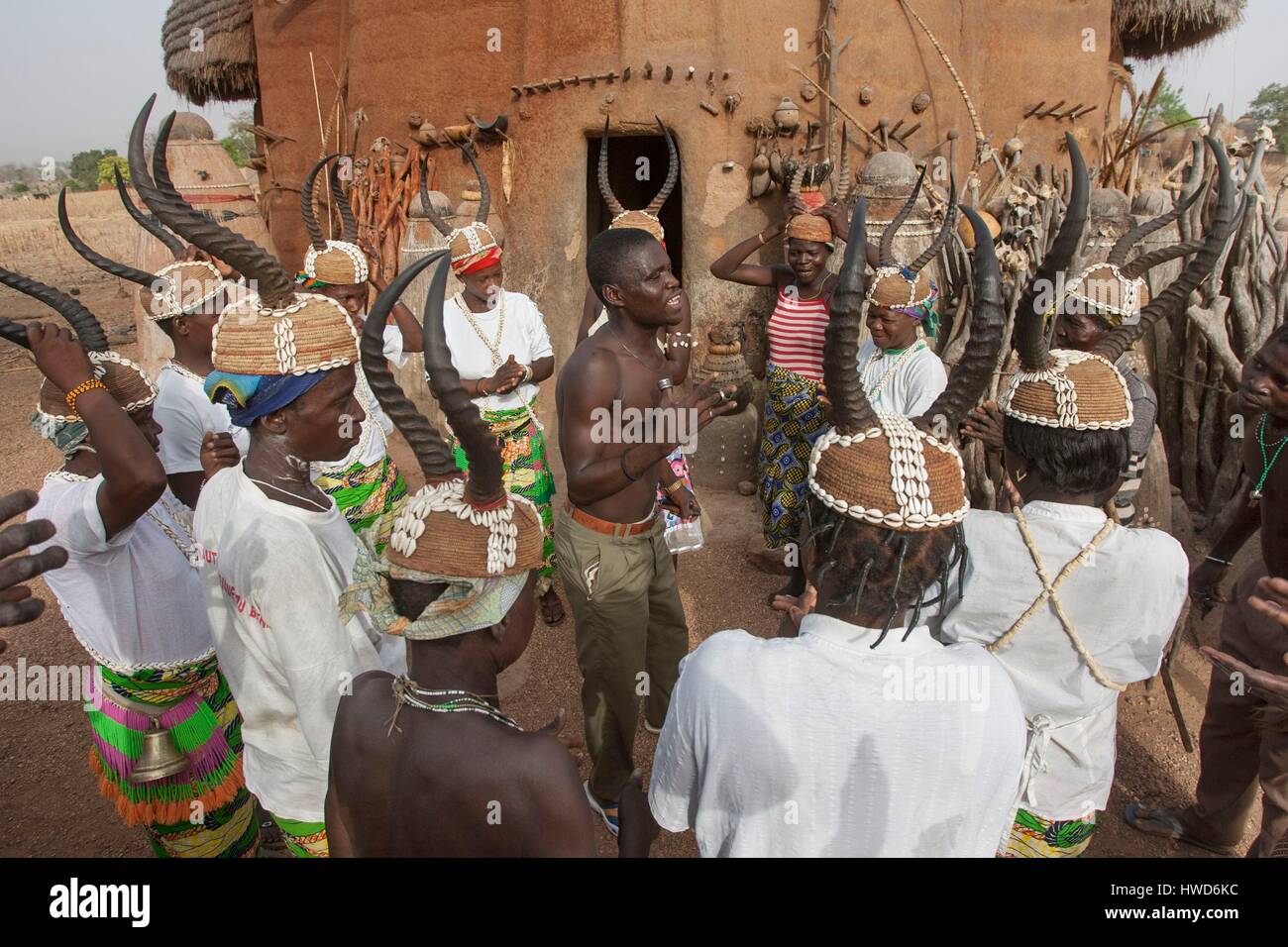 Togo, northern region, Tamberma in front of a Tata, classified World Heritage of Humanity, ancestor fetishes are placed in front of the entrance of the house Stock Photo