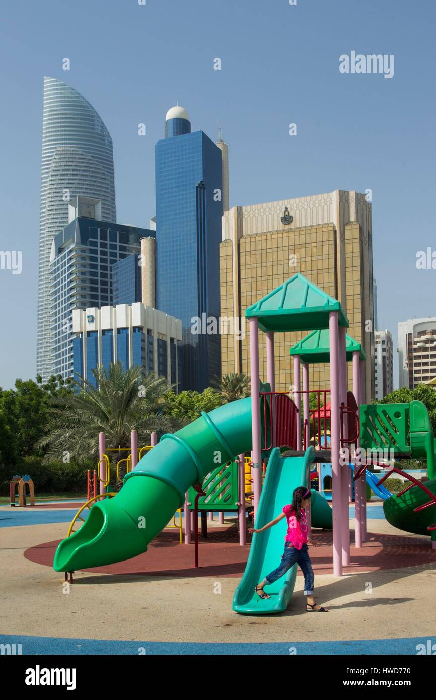 United Arab Emirates, Abu Dhabi, skyscrapers on Corniche with kids garden Stock Photo