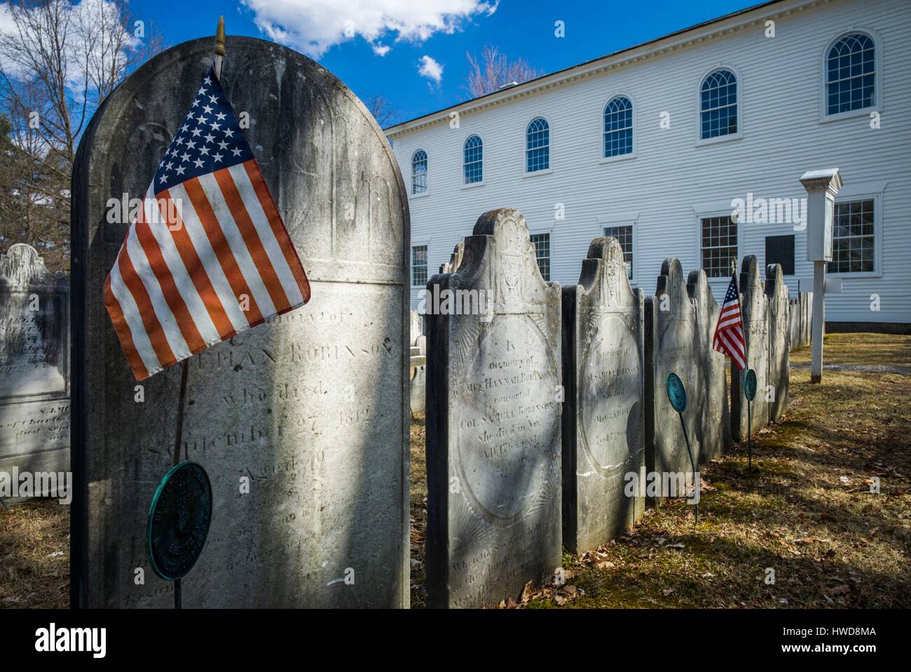 United States, Vermont, Bennington, Old First Church Burying Ground, gravestones with US flag Stock Photo