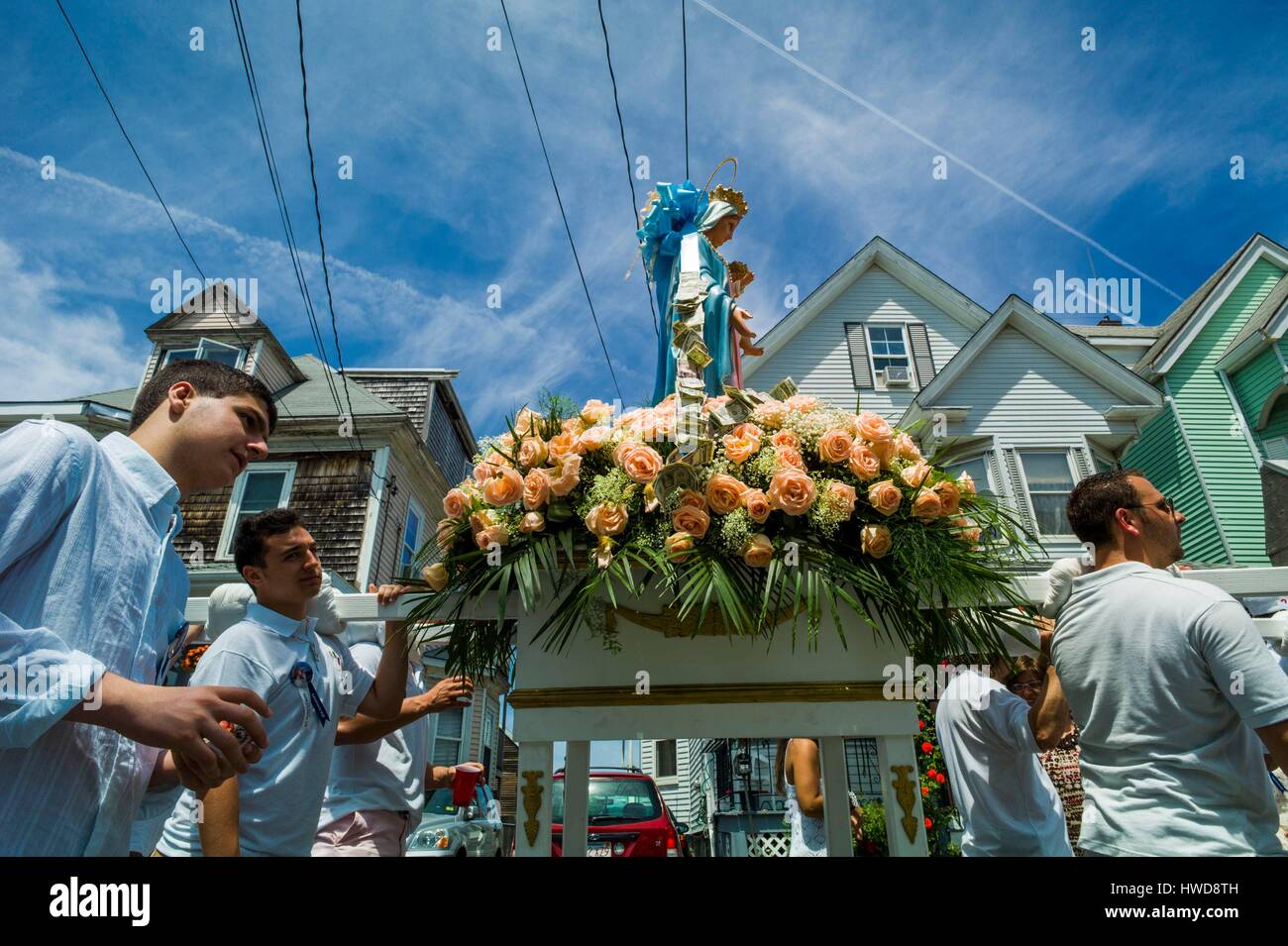 United States, Massachusetts, Cape Ann, Gloucester, Saint Peter's Fiesta, Festival to honor patron saint of fishermen, America's Oldest Seaport, men carrying Saint Peter statue Stock Photo