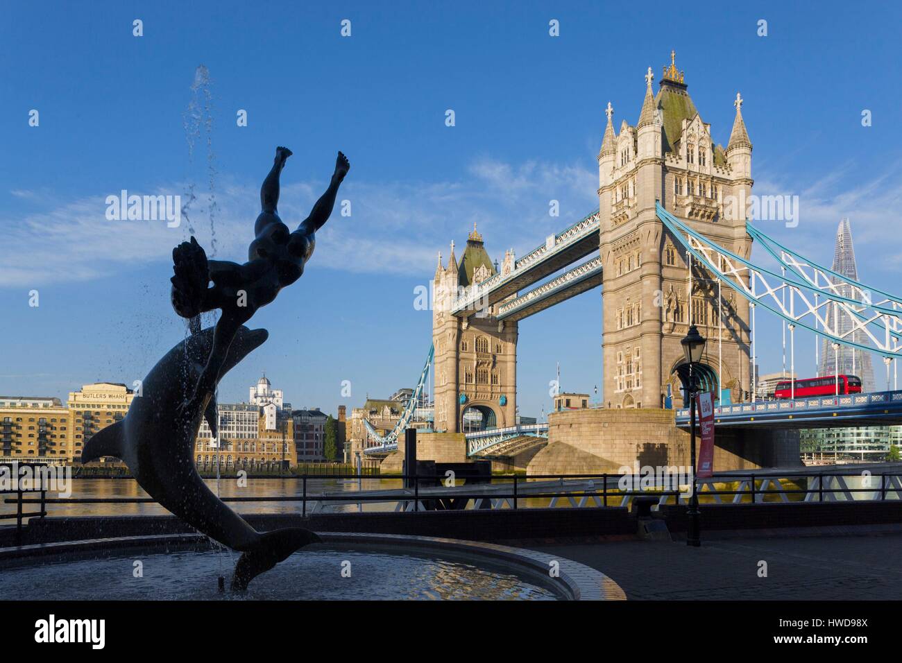 United Kingdom, London, Tower Bridge, Girl with a dolphin statue by David Wynneat in the background the Tower The Shard by architect Renzo Piano Stock Photo