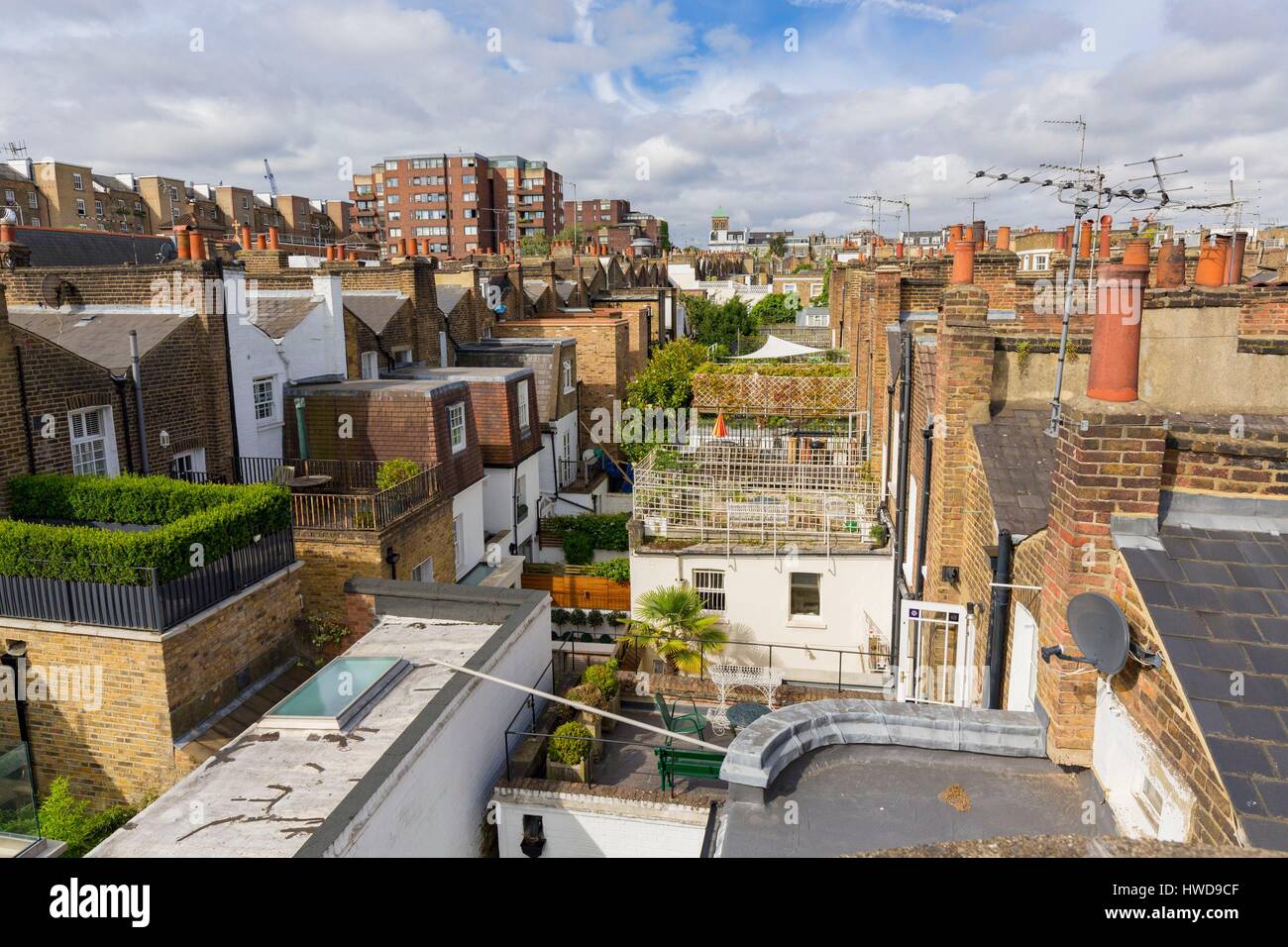 United Kingdom, London, Kensington district close to Notting Hill, roofs townhouses with outdoor patios upstairs Stock Photo