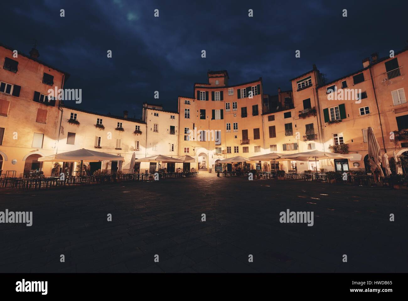 Piazza dell Anfiteatro in Lucca Italy night view Stock Photo