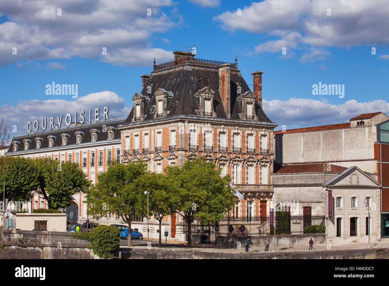 France, Charente, Jarnac, the Courvoisier cognac distillery on the banks of the Charente river Stock Photo