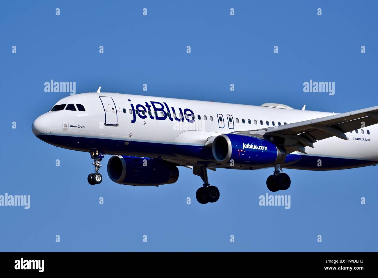 jetBlue Airlines plane in flight Stock Photo
