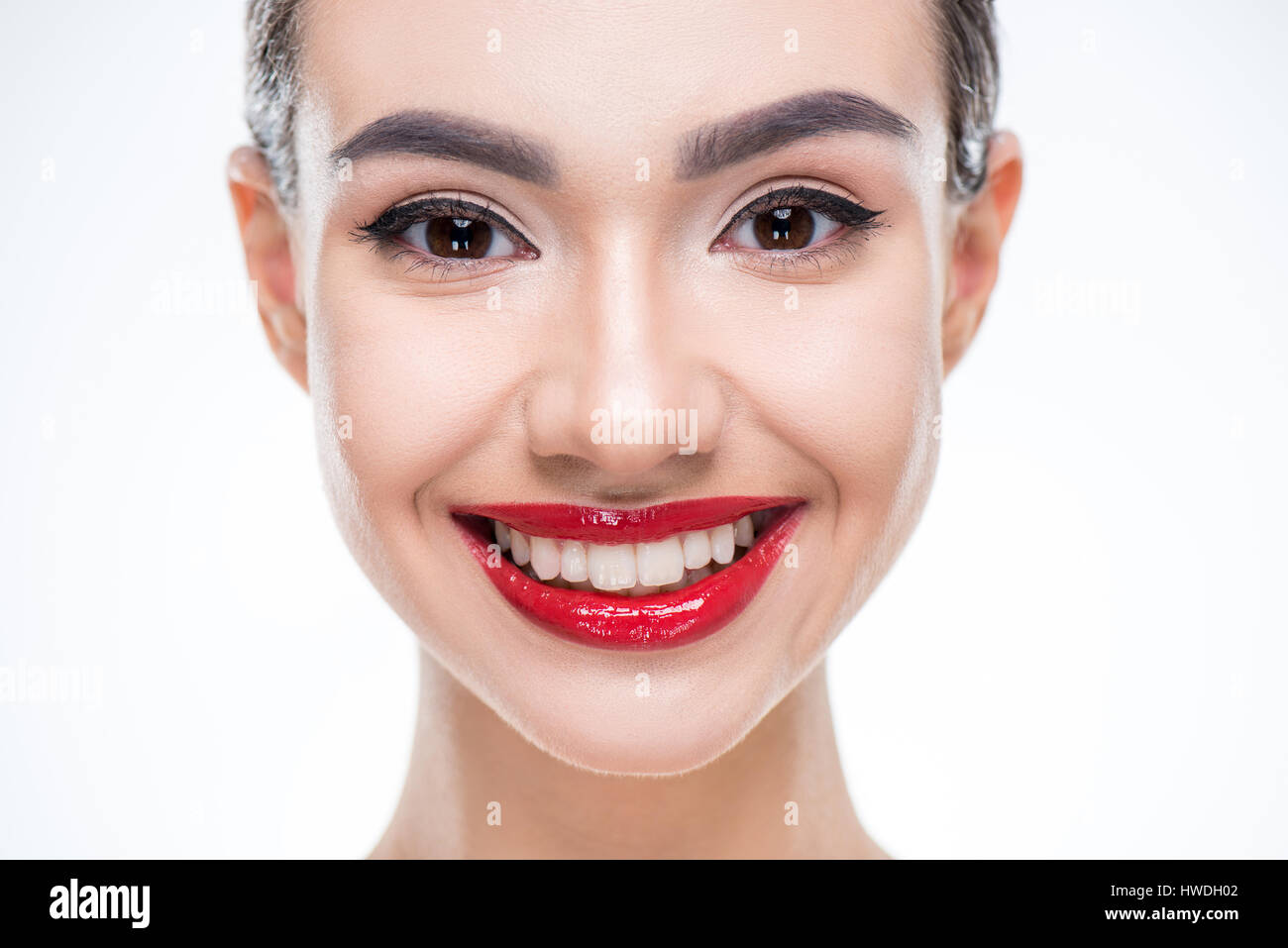 Portrait of beautiful woman with juicy red lips smiling isolated on white Stock Photo