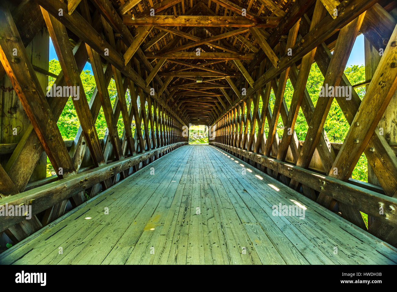 The Henniker Covered Bridge is a covered pedestrian footbridge serving