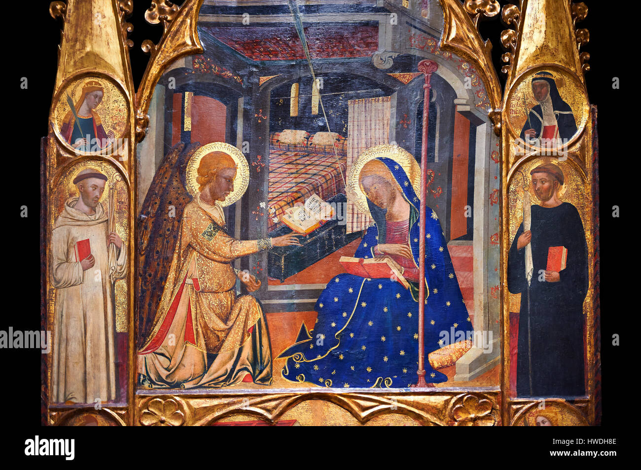 Gothic painted Panel Altarpiece of the Annunciation  by the Circle of Ferrer.  National Museum of Catalan Art, Barcelona, Spain, inv no: 015855-000 Stock Photo