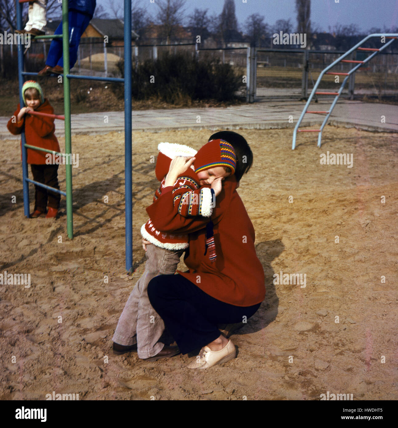 Weimar, GDR, kindergarten teacher trought a toddler Stock Photo