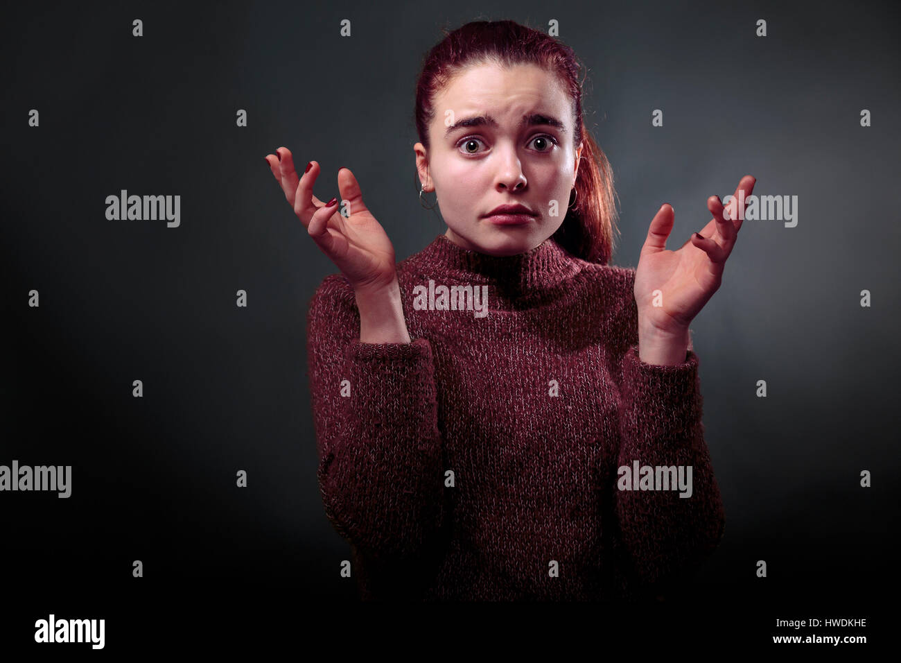 portrait of a surprised young woman Stock Photo - Alamy