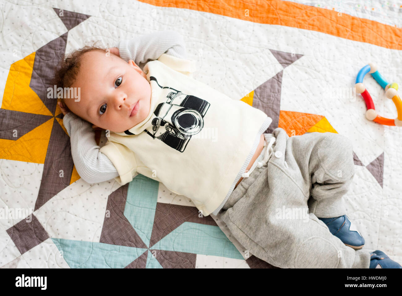 Portrait of baby boy lying on blanket, overhead view Stock Photo Alamy