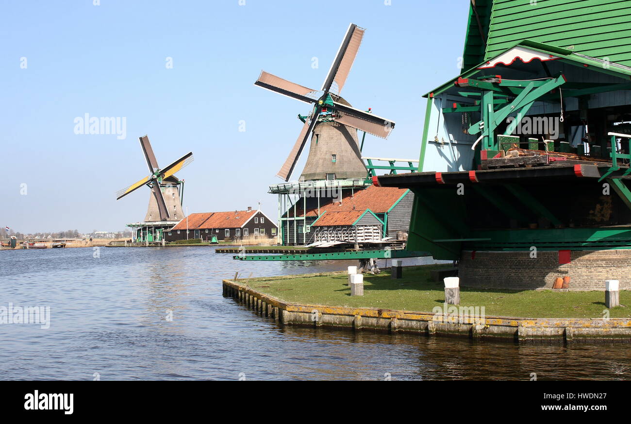Zaanse Schans, Zaandam / Zaandijk, Netherlands with in the middle18th century wind mill De Kat (The Cat), oldest functioning dye mill in the world. Stock Photo