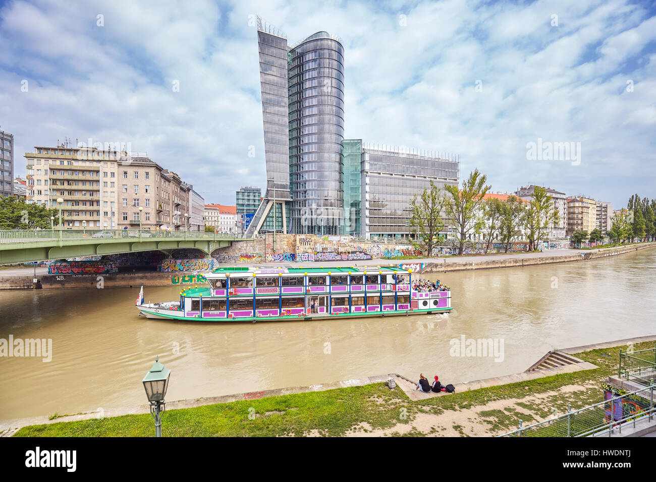 Vienna, Austria - August 15, 2016: Sightseeing tour ship on the Donaukanal (Danube Canal), former arm of the river Danube. Stock Photo