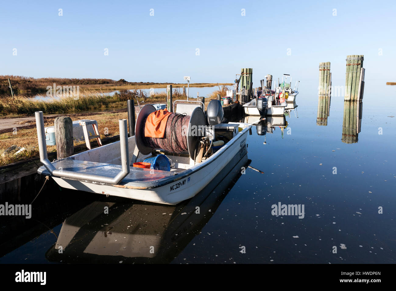 NC00739-00...NORTH CAROLINA - Fishing boats docked along the edge of the Pamlico Sound in Rodanthe on the Outer Banks. Stock Photo
