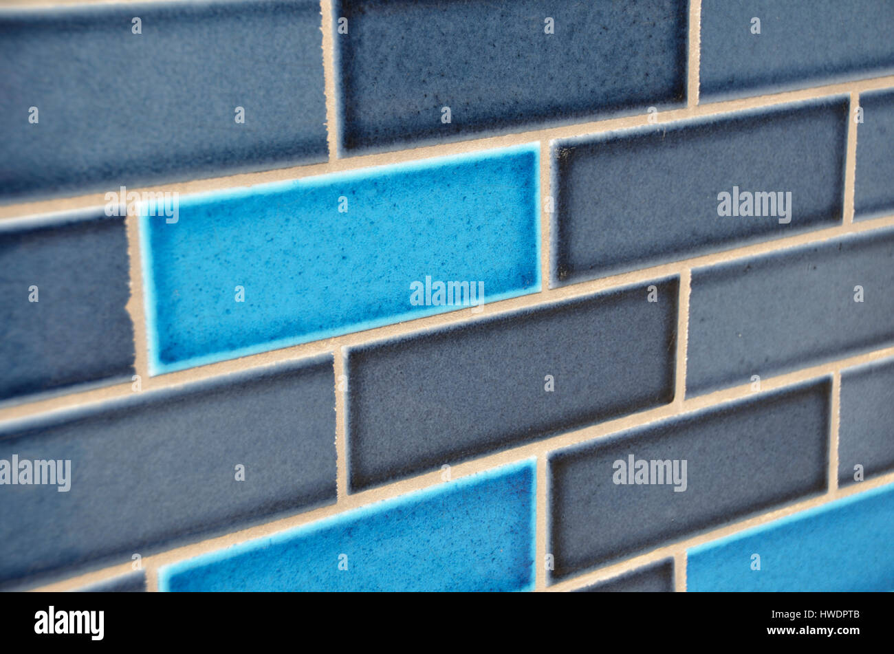 Blue tiles on a wall. Stock Photo