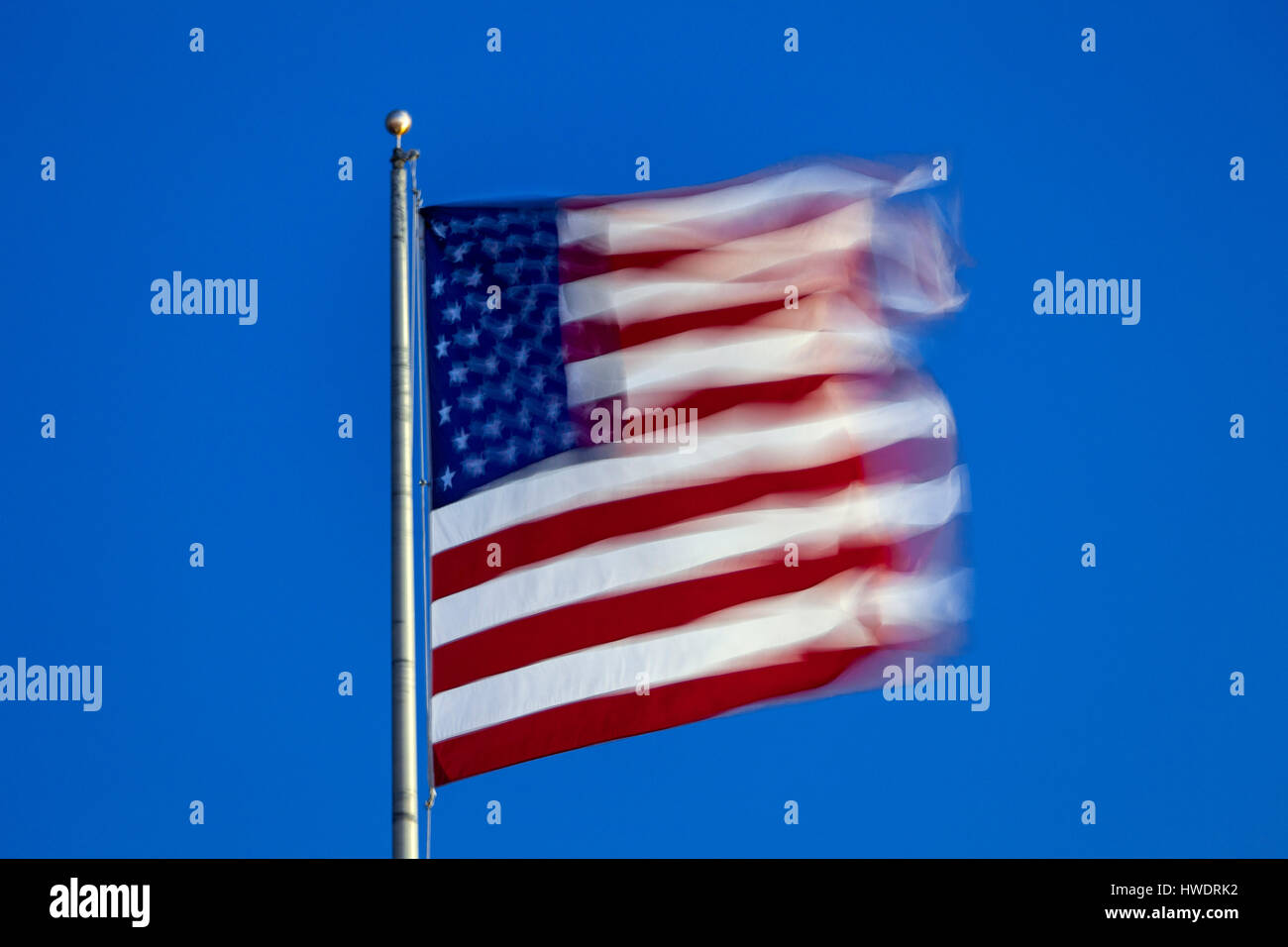 United states of america flag blowing in wind hi-res stock photography ...