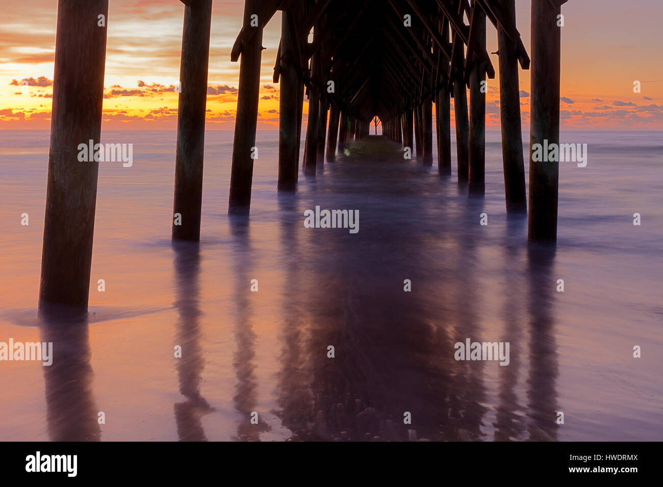 NC00904-00...NORTH CAROLINA - Sunrise at Surf City Pier. Stock Photo