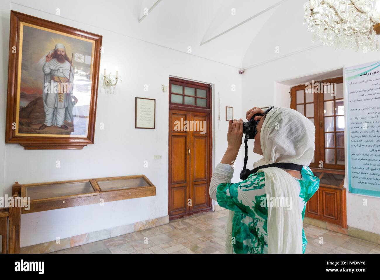 Iran, Central Iran, Yazd, Ateshkadeh, Zoroastrian Fire Temple, portrait of Zarathustra, prophet and woman photographer Stock Photo