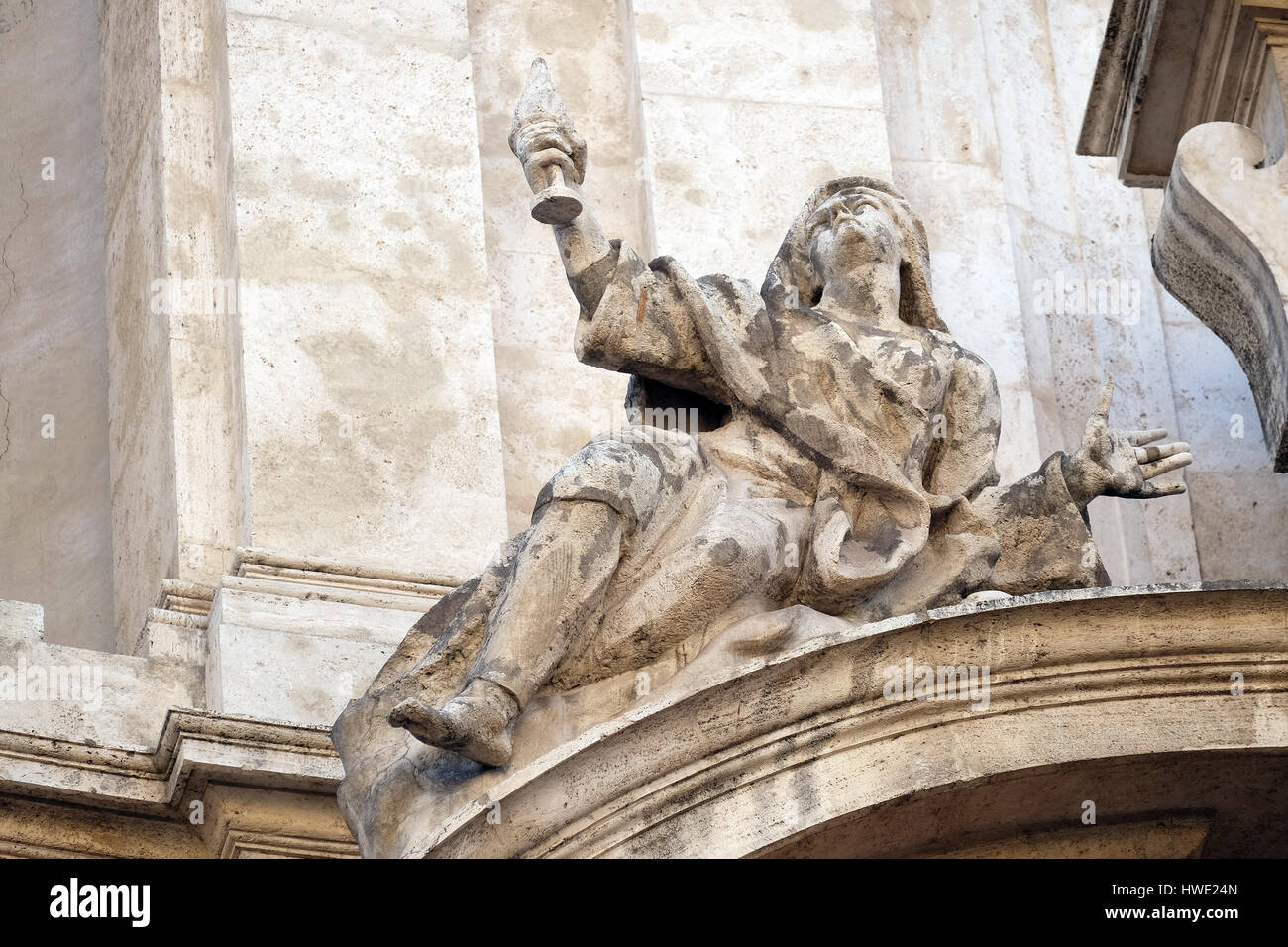 Angel on facade of San Marcello al Corso church in Rome, Italy on September 03, 2016. Stock Photo